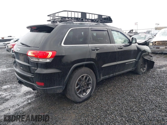 2015 Jeep Grand Cherokee Laredo with VIN 1C4RJFAGXFC602544, listed as a IAAI auction lot 41504666 with 190,170 mi miles. Bid and sale history available at carsss.com. Image 4.