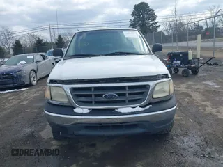 1999 Ford F-150 с VIN 1FTRX18W2XNB30523, выставлен на аукционе IAAI как лот 41617531 с пробегом 319 673 миль миль и . История ставок и продаж доступна на DreamBid. Изображение 12.
