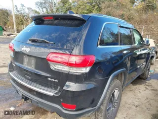 2019 Jeep Grand Cherokee Limited with VIN 1C4RJFBGXKC654555, listed as a IAAI auction lot 41310612 with 96,800 mi miles. Bid and sale history available at carsss.com. Image 4.