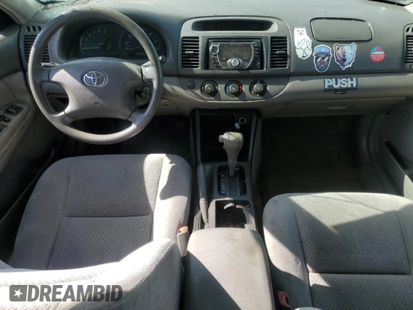 2004 Toyota Camry LE z VIN 4T1BE32K34U881717, wystawiony jako Copart lot #53731565 z przebiegiem Nie podano mil oraz Szkoda całkowita • Salvage title. Historia ofert i sprzedaży dostępna na DreamBid. Obrazek 8.