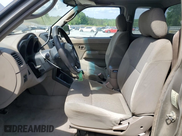 2003 Nissan Frontier XE with VIN 1N6DD26T43C452553, listed as a Copart auction lot 53139715 with 217,731 mi miles and Salvage title. Bid and sale history available at DreamBid. Image 7.