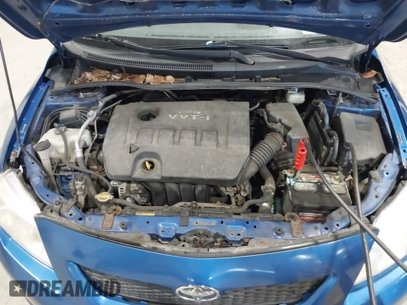 2009 Toyota Corolla with VIN JTDBL40E699037792, listed as a IAAI auction lot 41838231 with 199,690 mi miles. Bid and sale history available at carsss.com. Image 10.