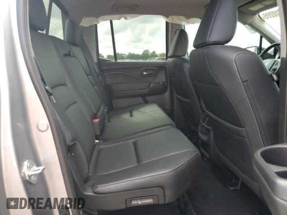 2023 Honda Ridgeline RTL-E with VIN 5FPYK3F70PB018858, listed as a Copart auction lot 64210205 with 16,562 mi miles and Salvage title. Bid and sale history available at DreamBid. Image 10.