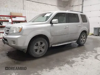 2011 Honda Pilot EX-L with VIN 5FNYF4H66BB029802, listed as a IAAI auction lot 42101545 with 240,127 mi miles and . Bid and sale history available at carsss.com. Image 2.
