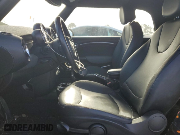 2011 MINI Convertible with VIN WMWZN3C53BT133576, listed as a Copart auction lot 87543835 with 69,999 mi miles and Salvage title. Bid and sale history available at DreamBid. Image 7.