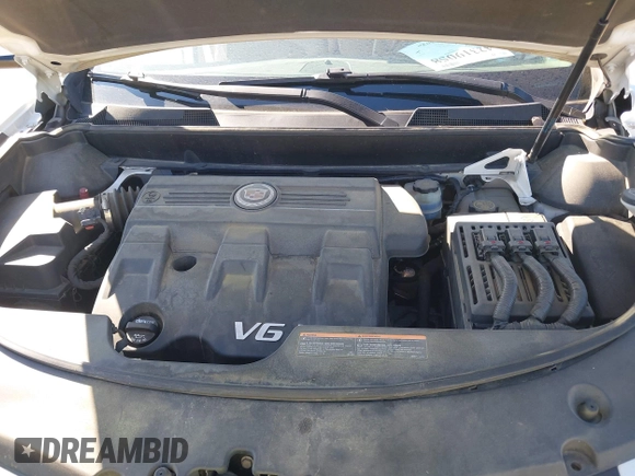2013 Cadillac SRX Performance Collection with VIN 3GYFNHE31DS597987, listed as a IAAI auction lot 42319058 with 139,670 mi miles and . Bid and sale history available at DreamBid. Image 10.