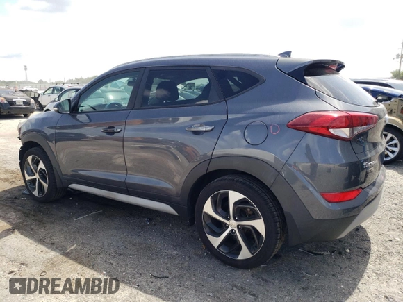 2018 Hyundai Tucson Sport z VIN KM8J33ALXJU764322, wystawiony jako Copart lot #59739985 z przebiegiem 79 882 mil mil oraz Szkoda całkowita • Salvage title. Historia ofert i sprzedaży dostępna na DreamBid. Obrazek 2.