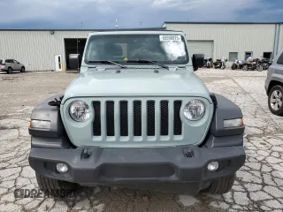 2023 Jeep Wrangler Sport with VIN 1C4HJXAG0PW595881, listed as a Copart auction lot 65590025 with 19,597 mi miles and Salvage title. Bid and sale history available at DreamBid. Image 5.