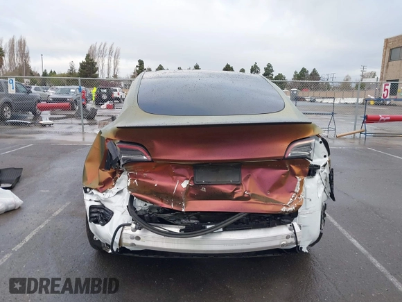 2023 Tesla Model Y Performance with VIN 7SAYGDEF4PF738885, listed as a IAAI auction lot 41798997 with 59,270 mi miles and . Bid and sale history available at DreamBid. Image 17.