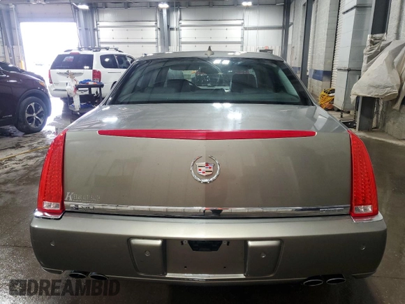 2011 Cadillac DTS Premium Collection z VIN 1G6KH5E68BU143689, wystawiony jako Copart lot #51861855 z przebiegiem 124 522 mil mil oraz Szkoda całkowita • Salvage title. Historia ofert i sprzedaży dostępna na DreamBid. Obrazek 6.