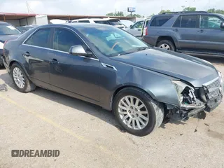 2011 Cadillac CTS Luxury z VIN 1G6DF5EYXB0151106, wystawiony jako IAAI lot #42107070 z przebiegiem 140 468 mil mil oraz . Historia ofert i sprzedaży dostępna na DreamBid. Obrazek 1.