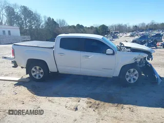2015 GMC Canyon 2WD SLE with VIN 1GTG5BE32F1254150, listed as a IAAI auction lot 41380439 with 129,098 mi miles. Bid and sale history available at carsss.com. Image 13.