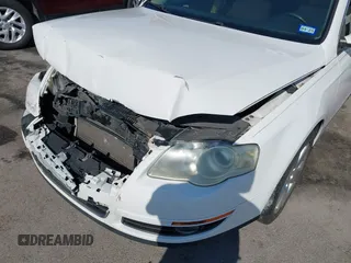 2009 Volkswagen Passat z VIN WVWJK93C29P033434, wystawiony jako IAAI lot #41698532 z przebiegiem 129 256 mil mil oraz . Historia ofert i sprzedaży dostępna na DreamBid. Obrazek 17.
