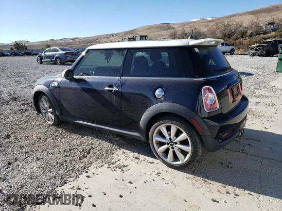 2013 MINI Hardtop S with VIN WMWSV3C52DT393181, listed as a Copart auction lot 50179065 with 66,655 mi miles and Salvage Title. Bid and sale history available at DreamBid. Image 2.