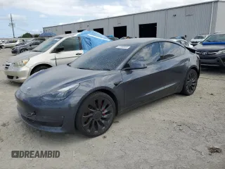2023 Tesla Model 3 Performance z VIN 5YJ3E1EC8PF428952, wystawiony jako Copart lot #51566665 z przebiegiem 189 mil mil oraz Szkoda całkowita • Salvage title. Historia ofert i sprzedaży dostępna na DreamBid. Obrazek 1.