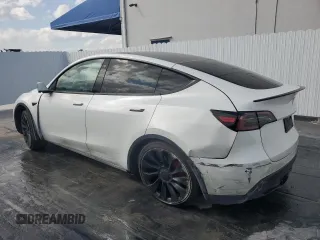 2023 Tesla Model Y Performance with VIN 7SAYGDEF8PF595178, listed as a Copart auction lot 46496995 with 39,057 mi miles and Non Repairable. Bid and sale history available at DreamBid. Image 2.