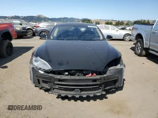 2014 Tesla Model S 60 z VIN 5YJSA1S19EFP56100, wystawiony jako Copart lot #62331725 z przebiegiem Nie podano mil oraz Szkoda całkowita • Salvage title. Historia ofert i sprzedaży dostępna na DreamBid. Obrazek 5.