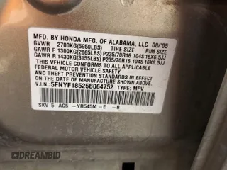 2005 Honda Pilot EX-L z VIN 5FNYF18525B064752, wystawiony jako Copart lot #56022115 z przebiegiem 221 161 mil mil oraz Szkoda całkowita • Salvage title. Historia ofert i sprzedaży dostępna na DreamBid. Obrazek 13.