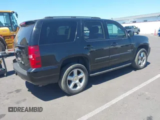 2007 Chevrolet Tahoe LT with VIN 1GNFK13057J112892, listed as a IAAI auction lot 42723713 with 232,044 mi miles and . Bid and sale history available at DreamBid. Image 4.
