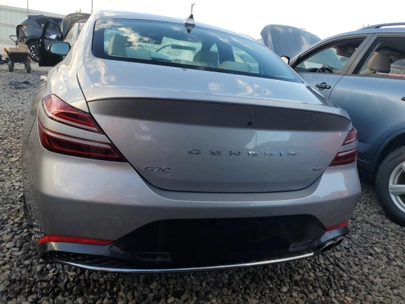 2023 Genesis G70 2.0T with VIN KMTG34TAXPU129319, listed as a Copart auction lot 73239224 with 18,785 mi miles and Non Repairable. Bid and sale history available at DreamBid. Image 6.