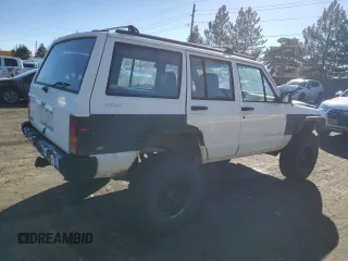 1996 Jeep Cherokee Sport with VIN 1J4FJ68S7TL325967, listed as a Copart auction lot 43654245 with 204,182 mi miles and Salvage Title. Bid and sale history available at carsss.com. Image 3.