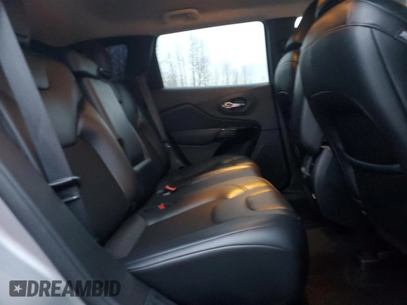 2021 Jeep Cherokee Latitude Plus z VIN 1C4PJLLBXMD143997, wystawiony jako Copart lot #87973025 z przebiegiem 64 267 mil mil oraz Szkoda całkowita • Salvage title. Historia ofert i sprzedaży dostępna na DreamBid. Obrazek 10.