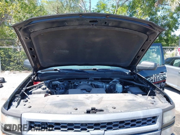 2015 Chevrolet Silverado 1500 LS with VIN 1GCRCPEH6FZ398471, listed as a IAAI auction lot 42015821 with 126,679 mi miles and . Bid and sale history available at DreamBid. Image 10.