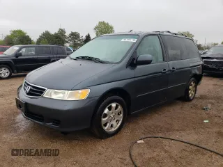 2004 Honda Odyssey EX-L z VIN 5FNRL18924B040028, wystawiony jako Copart lot #55338715 z przebiegiem 242 055 mil mil oraz Szkoda całkowita • Salvage title. Historia ofert i sprzedaży dostępna na DreamBid. Obrazek 1.