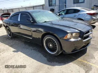 2013 Dodge Charger SE z VIN 2C3CDXBG6DH509939, wystawiony jako Copart lot #57851415 z przebiegiem 182 634 mil mil oraz Szkody całkowita. Historia ofert i sprzedaży dostępna na DreamBid. Obrazek 4.