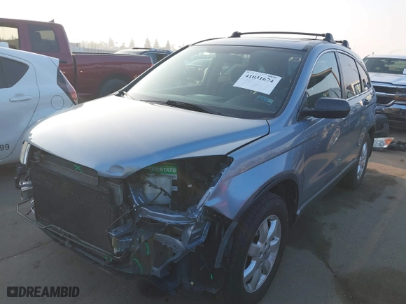 2008 Honda CR-V EX with VIN 3CZRE38568G706370, listed as a IAAI auction lot 41031674 with 124,494 mi miles. Bid and sale history available at carsss.com. Image 2.