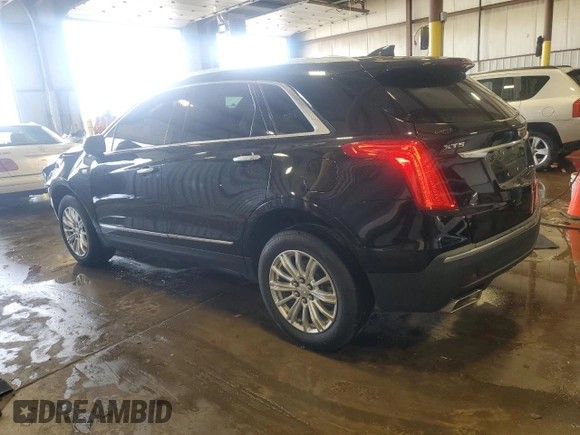 2017 Cadillac XT5 FWD with VIN 1GYKNARS0HZ257035, listed as a Copart auction lot 64284525 with 102,605 mi miles and Salvage title. Bid and sale history available at DreamBid. Image 2.