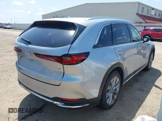 2025 Mazda CX-90 Premium Plus Package z VIN JM3KKEHD1S1228777, wystawiony jako IAAI lot #42218405 z przebiegiem 1 582 mil mil oraz . Historia ofert i sprzedaży dostępna na DreamBid. Obrazek 4.