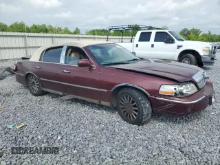 2004 Lincoln Town Car Signature z VIN 1LNHM81W54Y686970, wystawiony jako Copart lot #55615565 z przebiegiem 1 644 925 mil mil oraz Szkoda całkowita • Salvage title. Historia ofert i sprzedaży dostępna na DreamBid. Obrazek 4.