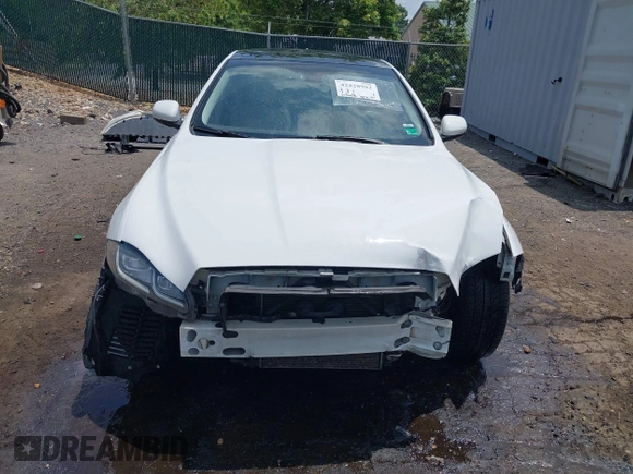 2016 Jaguar XJ R-Sport z VIN SAJWJ1CD6G8V95512, wystawiony jako IAAI lot #42428982 z przebiegiem 128 668 mil mil oraz . Historia ofert i sprzedaży dostępna na DreamBid. Obrazek 6.