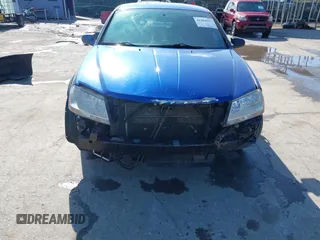 2013 Dodge Avenger SE with VIN 1C3CDZAB6DN653869, listed as a IAAI auction lot 41984957 with 163,626 mi miles. Bid and sale history available at carsss.com. Image 6.