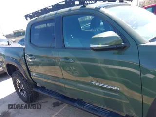 2021 Toyota Tacoma 4WD SR with VIN 3TMCZ5ANXMM382874, listed as a IAAI auction lot 41965388 with 62,178 mi miles. Bid and sale history available at carsss.com. Image 14.