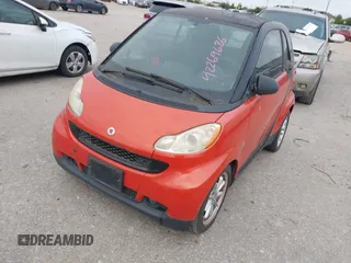 2008 Smart fortwo Pure z VIN WMEEJ31X28K206311, wystawiony jako IAAI lot #42269686 z przebiegiem 48 601 mil mil oraz . Historia ofert i sprzedaży dostępna na DreamBid. Obrazek 2.