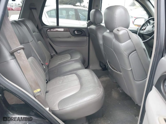2003 GMC Envoy SLT with VIN 1GKDS13S232298062, listed as a IAAI auction lot 41668380 with 195,045 mi miles. Bid and sale history available at carsss.com. Image 8.