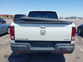 2019 Honda Ridgeline RTL-E with VIN 5FPYK3F74KB009279, listed as a IAAI auction lot 42348773 with 98,141 mi miles and . Bid and sale history available at DreamBid. Image 16.