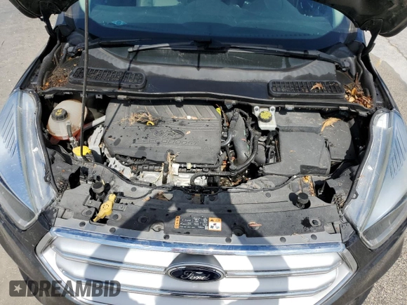 2017 Ford Escape SE z VIN 1FMCU0GDXHUE91333, wystawiony jako Copart lot #44536055 z przebiegiem Nie podano mil oraz Nie do naprawy • Non repairable. Historia ofert i sprzedaży dostępna na DreamBid. Obrazek 12.
