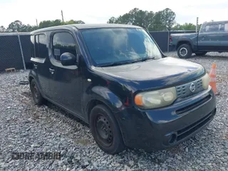 2010 Nissan Cube S z VIN JN8AZ2KR3AT164834, wystawiony jako IAAI lot #42030989 z przebiegiem 206 931 mil mil oraz . Historia ofert i sprzedaży dostępna na DreamBid. Obrazek 1.