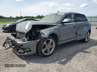 2014 Audi Q5 Premium Plus с VIN WA1VFCFP6EA011509, выставлен на аукционе Copart как лот 61139315 с пробегом 234 700 миль миль и Списание • Salvage title. История ставок и продаж доступна на DreamBid. Изображение 1.