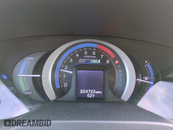 2010 Honda Insight LX with VIN JHMZE2H51AS011243, listed as a Copart auction lot 54445555 with 224,722 mi miles and Salvage Title. Bid and sale history available at DreamBid. Image 9.