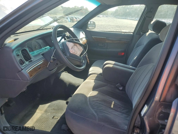 1998 Mercury Grand Marquis GS with VIN 2MEFM74W4WX656765, listed as a Copart auction lot 72720054 with 147,038 mi miles and Salvage Title. Bid and sale history available at carsss.com. Image 7.