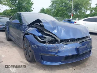 2022 Tesla Model S z VIN 5YJSA1E55NF493604, wystawiony jako IAAI lot #42503731 z przebiegiem 37 961 mil mil oraz . Historia ofert i sprzedaży dostępna na DreamBid. Obrazek 1.