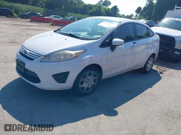 2013 Ford Fiesta S with VIN 3FADP4AJ7DM184180, listed as a IAAI auction lot 42632804 with 176,729 mi miles and . Bid and sale history available at DreamBid. Image 2.