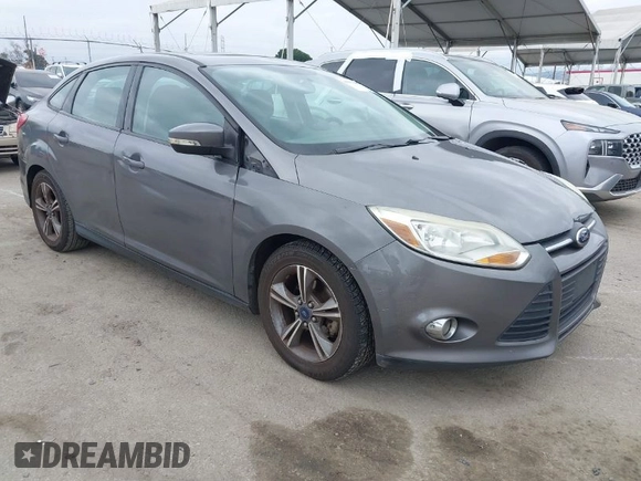 2014 Ford Focus SE with VIN 1FADP3F24EL416510, listed as a IAAI auction lot 41911464 with 186,153 mi miles. Bid and sale history available at carsss.com. Image 1.
