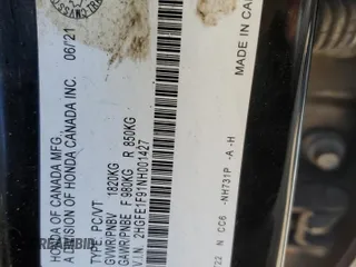 2022 Honda Civic Touring z VIN 2HGFE1F91NH001427, wystawiony jako Copart lot #53155195 z przebiegiem 83 921 mil mil oraz Szkoda całkowita • Salvage title. Historia ofert i sprzedaży dostępna na DreamBid. Obrazek 12.