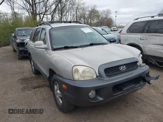 2004 Hyundai Santa Fe GLS z VIN KM8SC73E54U765442, wystawiony jako IAAI lot #42033078 z przebiegiem 167 706 mil mil oraz . Historia ofert i sprzedaży dostępna na DreamBid. Obrazek 1.