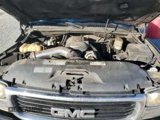 2001 GMC Sierra 1500HD SLE z VIN 1GTGK13U21F169593, wystawiony jako Copart lot #80849014 z przebiegiem 382 449 mil mil oraz Szkody całkowita. Historia ofert i sprzedaży dostępna na DreamBid. Obrazek 11.